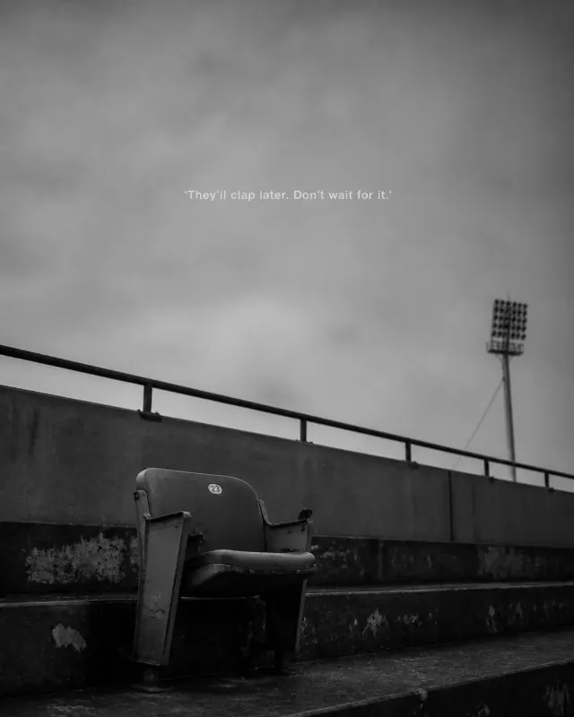 Black And White Empty Stadium Seat Quote