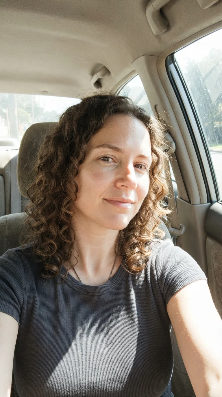 Candid Curly Haired Car Selfie