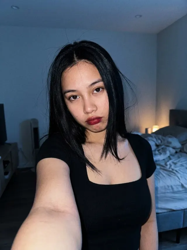 Dark Room TV Glow Selfie Portrait
