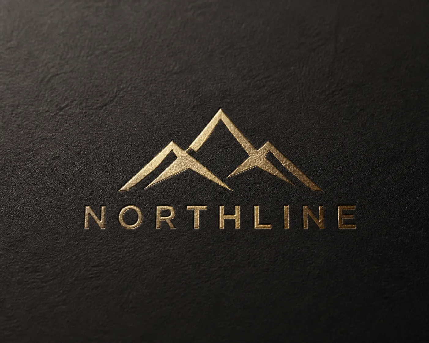 Gold Foil Logo On Black Cardstock