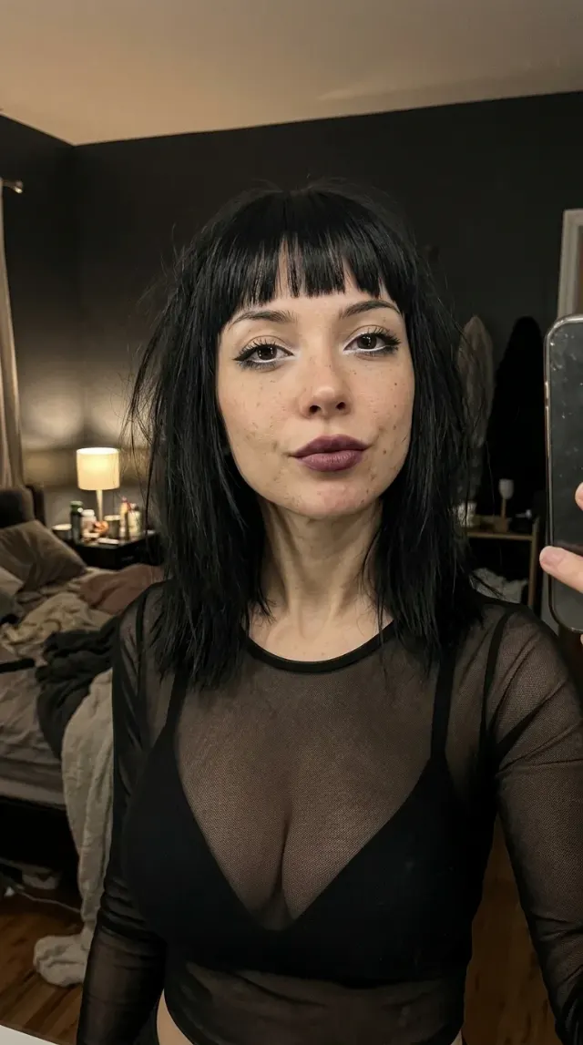 Goth Woman Phone Selfie In Dim Room