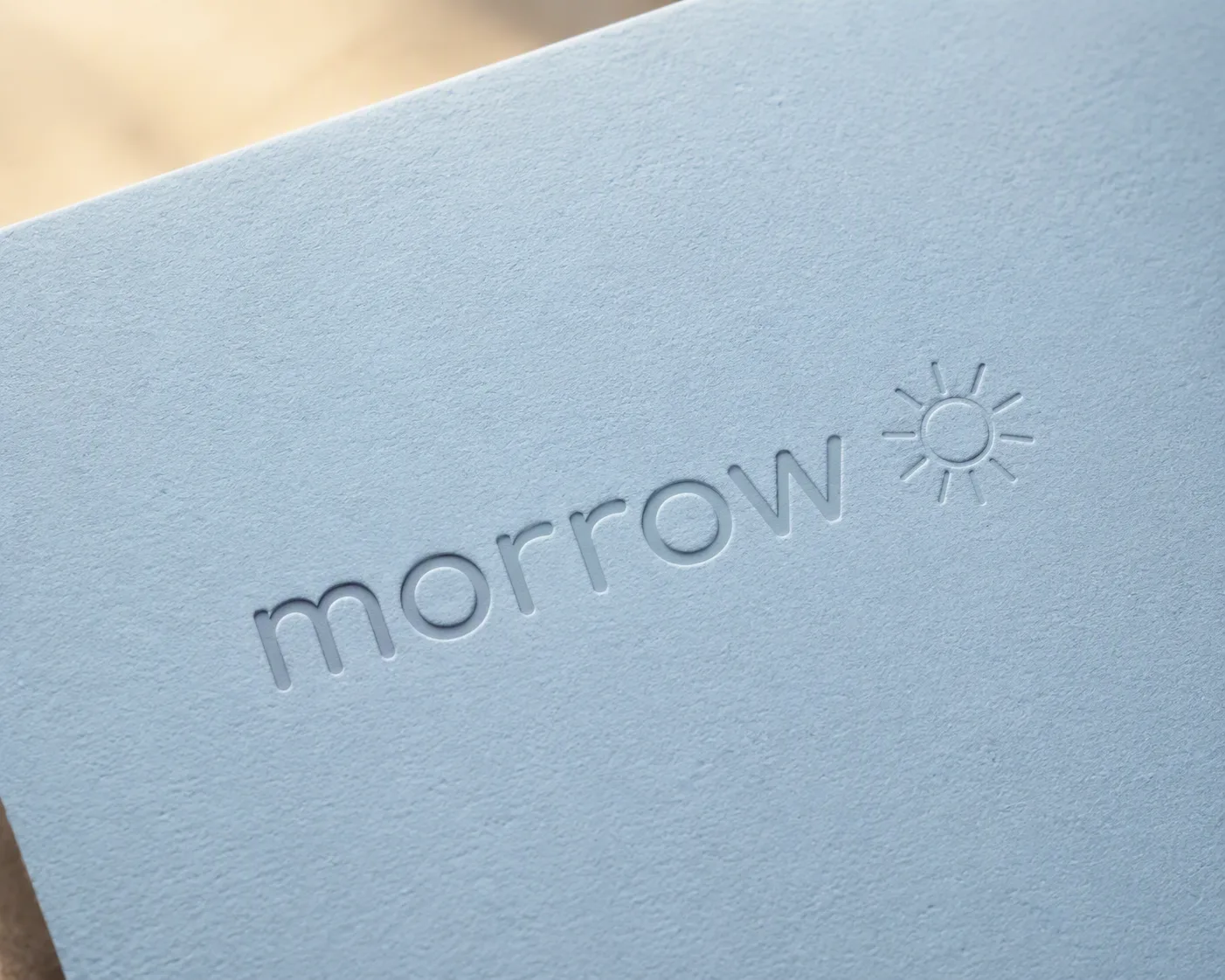 Warm Pastel Paper Embossed Logo Mockup