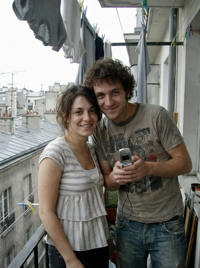 Faded 2000s Couple Balcony Phone Photo