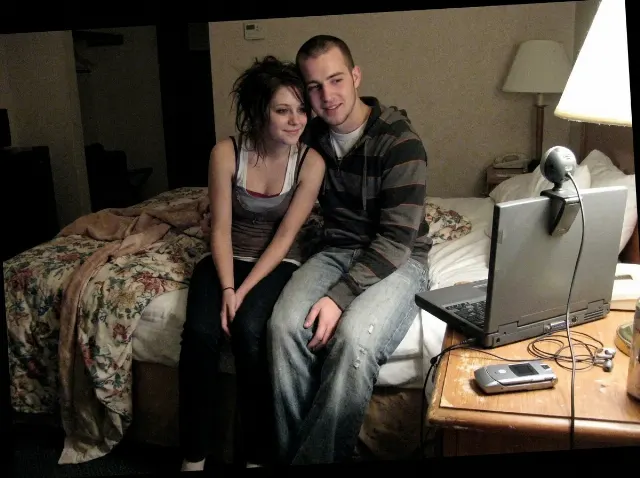 Late 2000s Couple Webcam Hotel Photo