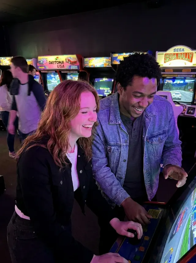 Neon Arcade Couple Night Photo