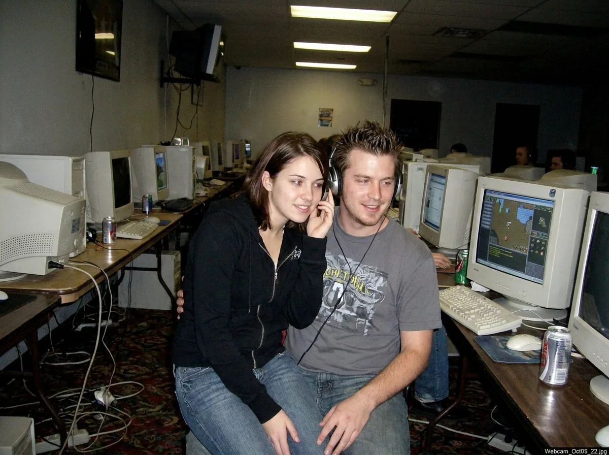 Noisy 2000s Cybercafe Couple Webcam Photo