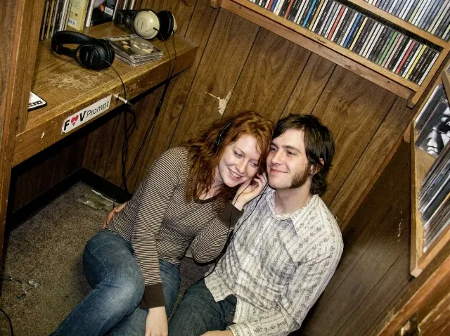 Noisy 2000s Record Shop Couple Photo