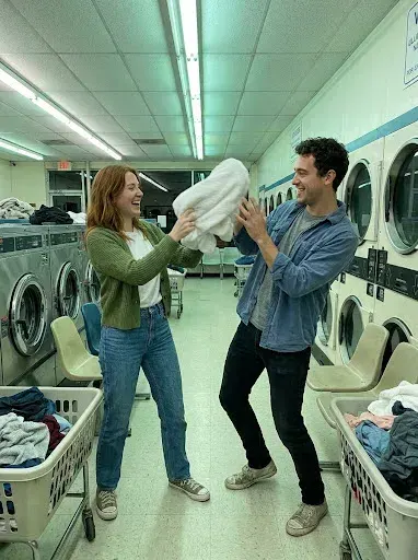 Playful Laundromat Couple Photo