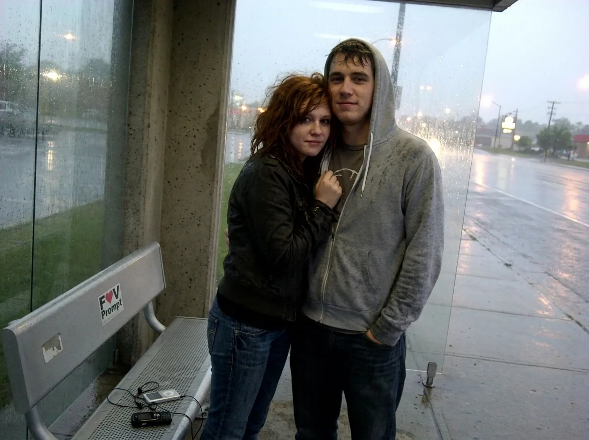 Rainy Bus Stop Couple Phone Photo